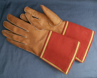 17th century gauntlets with cloth cuffs edged with gold lace